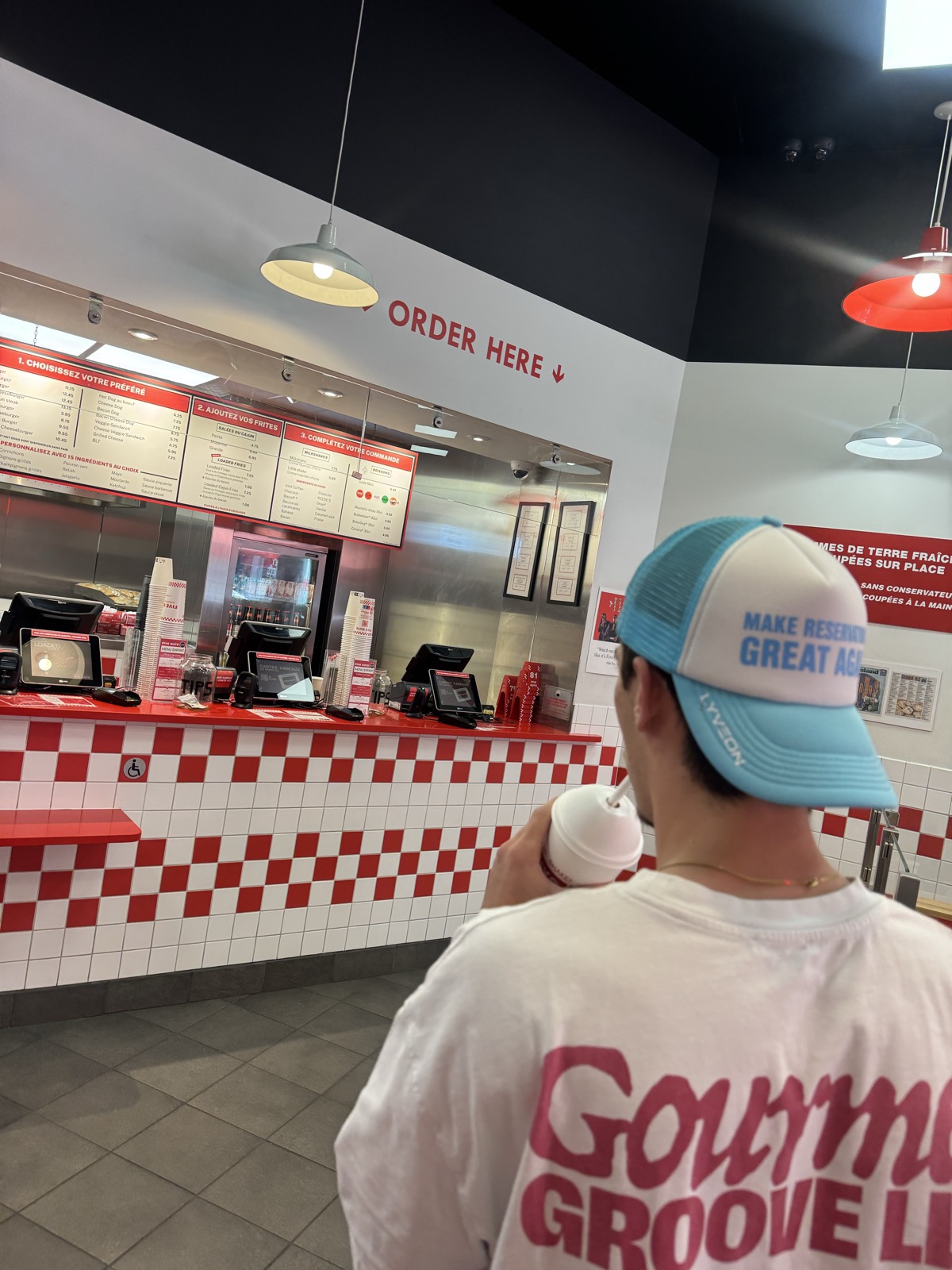 Lyveon blue cap in restaurant